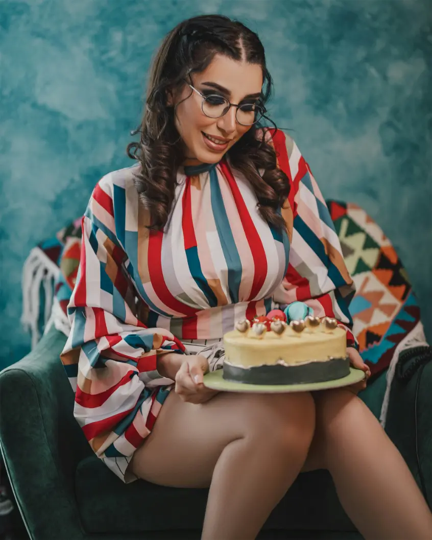 Sexy Dundee escort with a cake