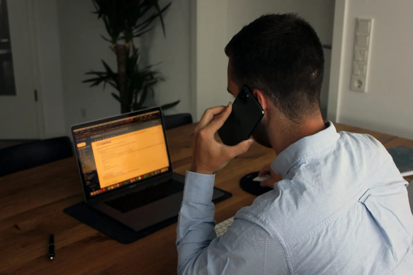 Man booking an escort on the phone