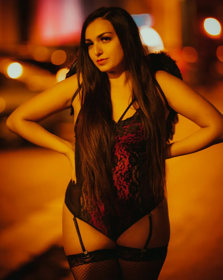 Sexy Hull escort in a dark bodice and stockings
