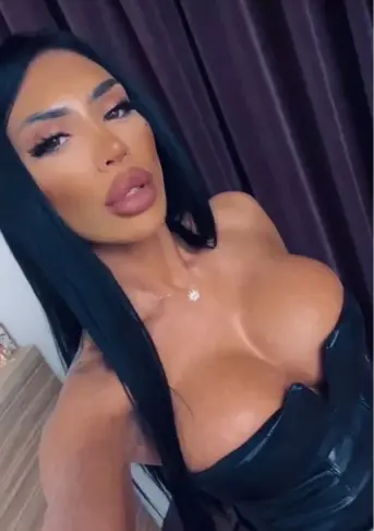Busty raven haired Woking escort