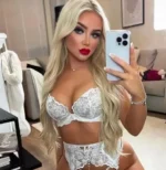 Beautiful blonde Swansea escort in white lingerie