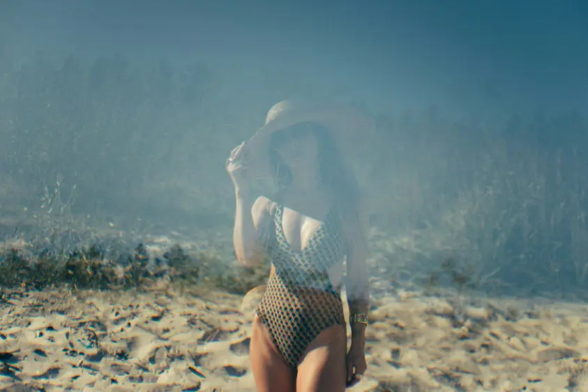 Busty escort at the beach