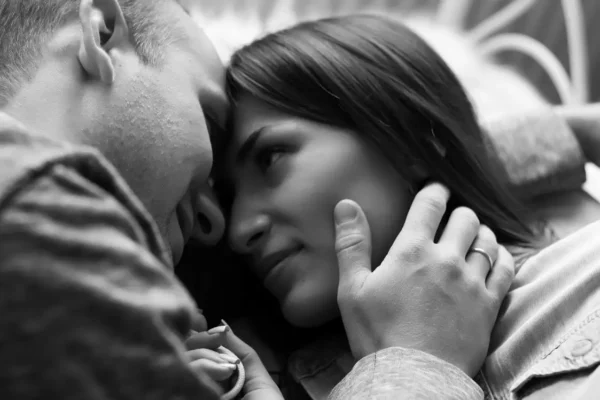Man and woman embracing