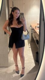 Busty brunette London escort taking a selfie