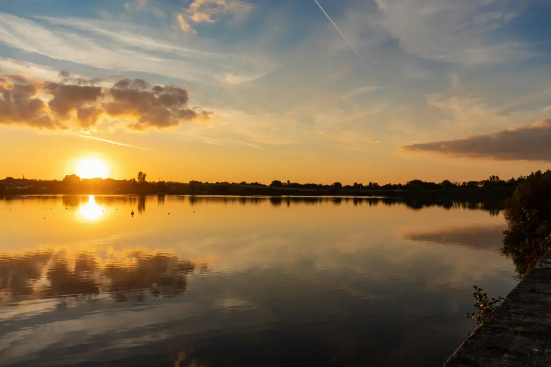A lake in Wigan at sunset
