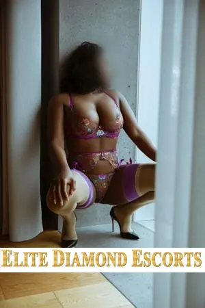 Ebony escort wearing bright lingerie