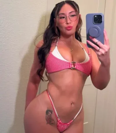 Curvy Brazilian female escort in a bikini